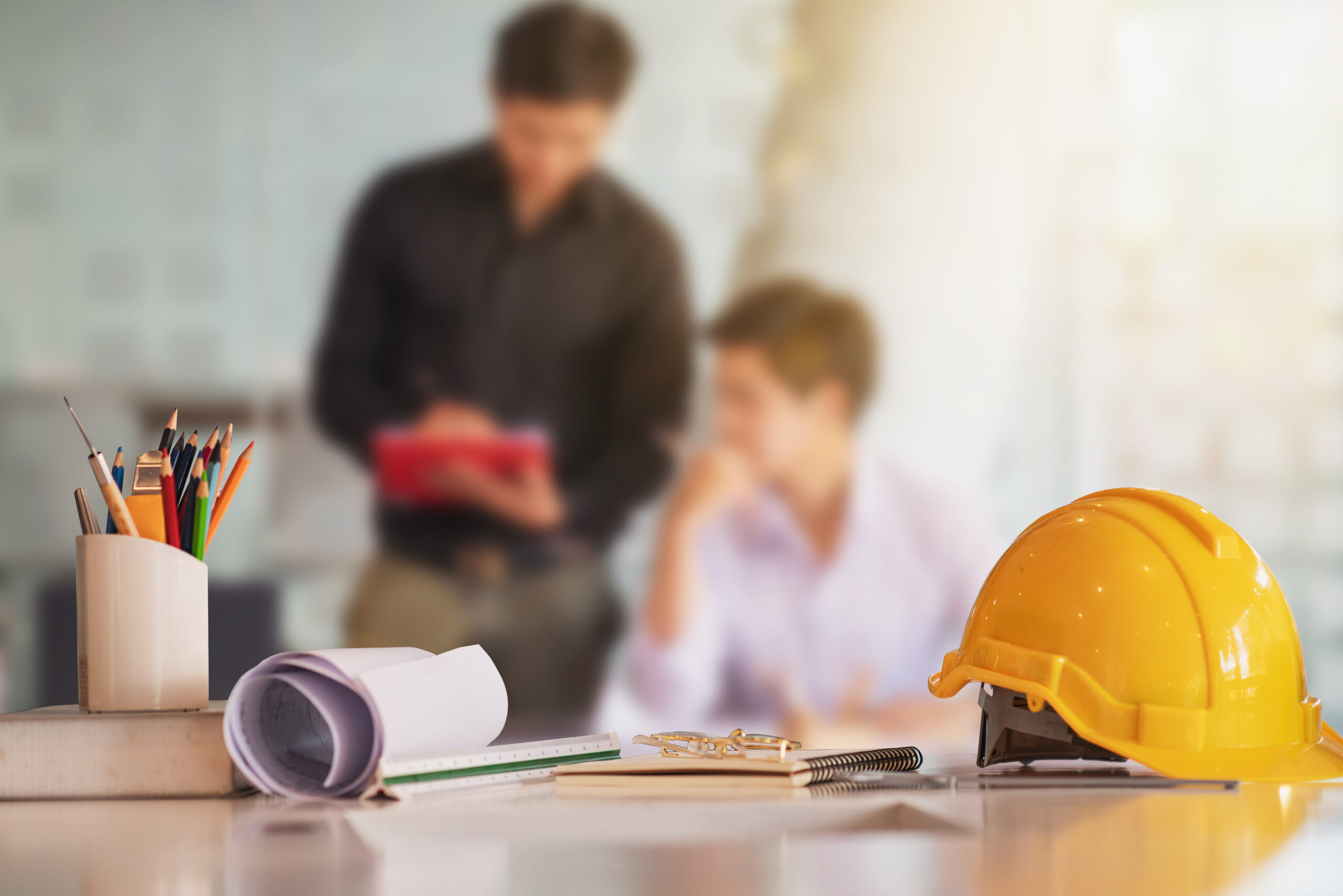 Business engineer contractor who contracts to supplies consulting about working their job at construction site office headquarters.